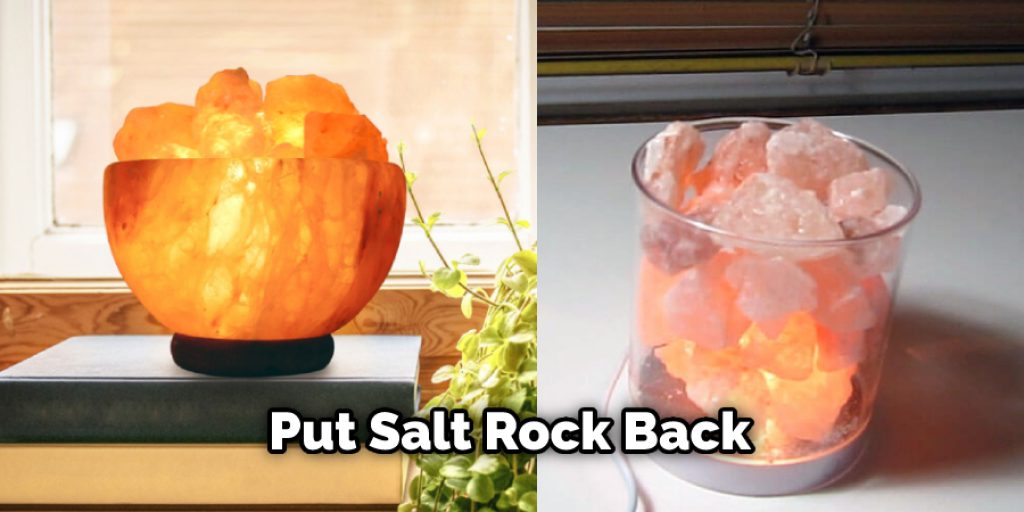 Put the salt rock back into place over the bulb and reattach all of the parts in the reverse order you took them off. 