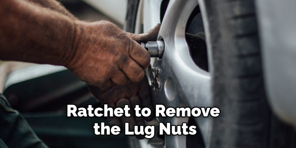 Ratchet to Remove the Lug Nuts