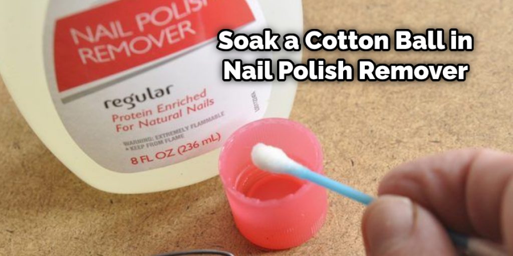Soak a Cotton Ball in Nail Polish Remover
