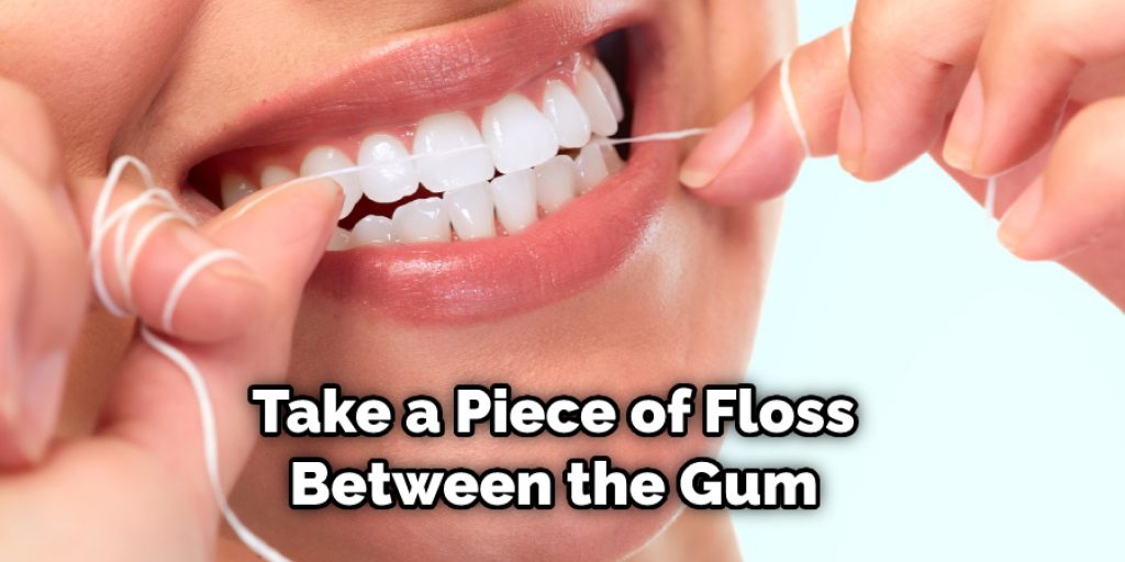 Take a Piece of Floss Between the Gum