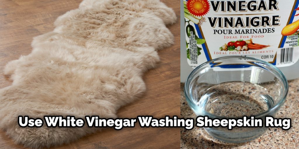 Then, refill the washer with lukewarm water and two capfuls of white vinegar.