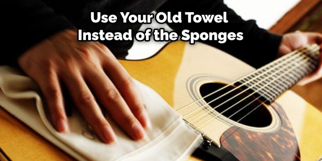 You can use your old towel instead of the sponges. The process is the same. Just make sure to soak the water so that it doesn’t drip inside of your water.