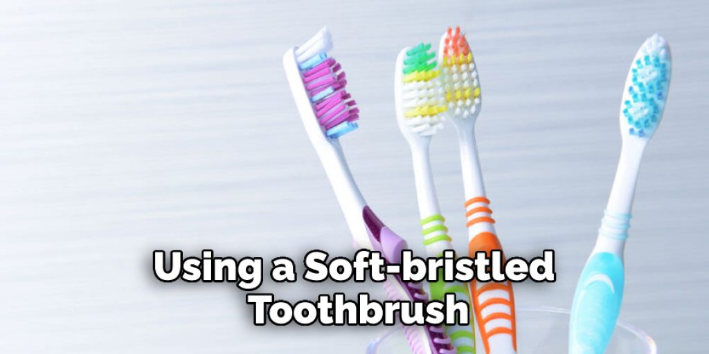 Using a Soft-bristled Toothbrush