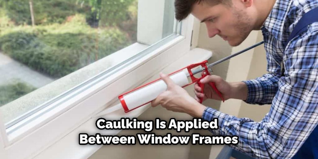 Caulking Is Applied Between Window Frames