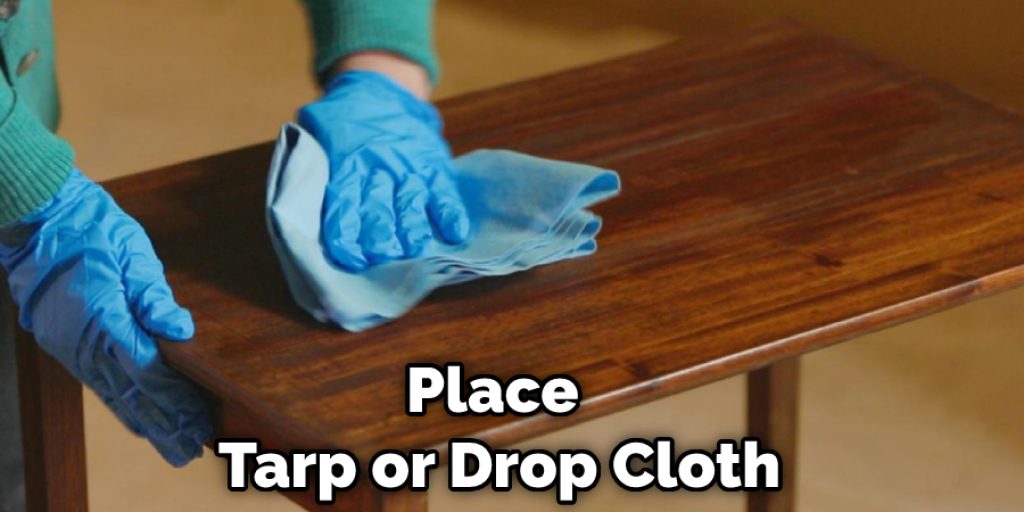 Place Tarp or Drop Cloth