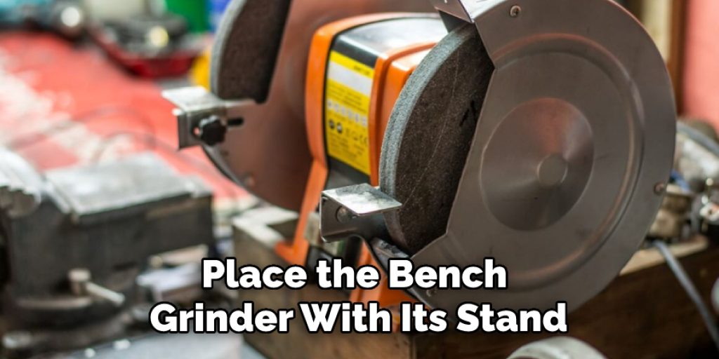 Place the Bench Grinder With Its Stand