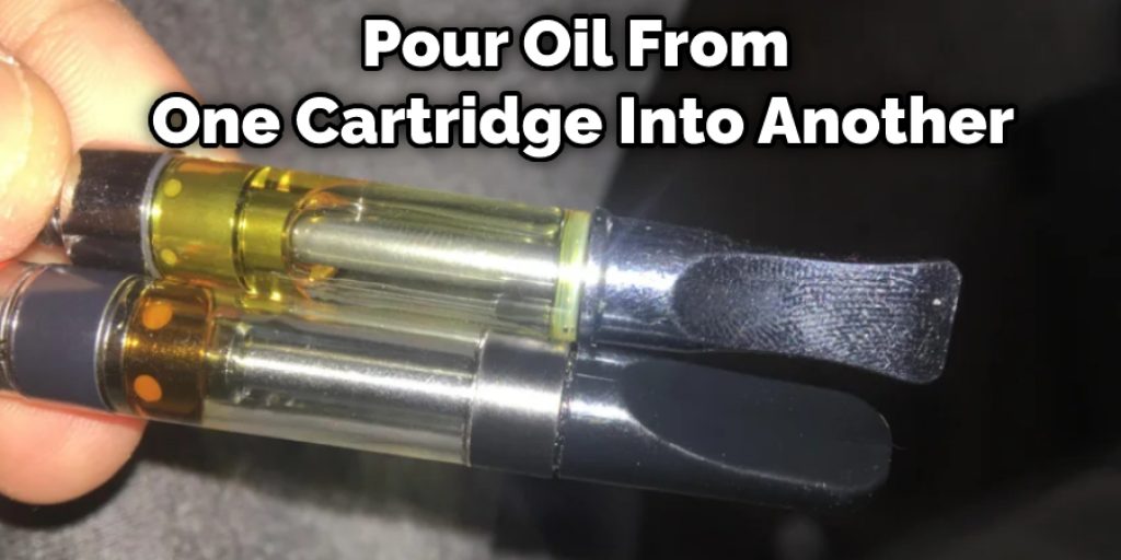 Pour Oil From One Cartridge Into Another