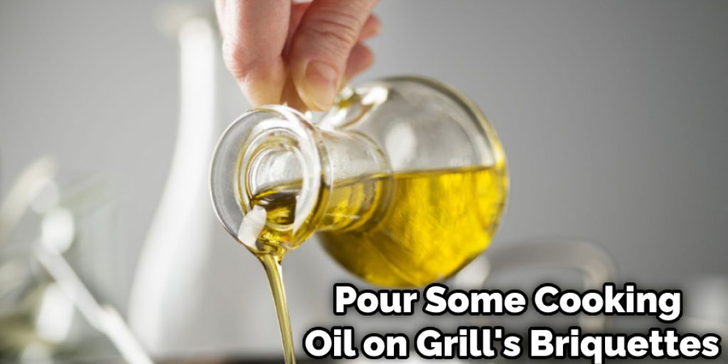 Pour Some Cooking Oil on Grill's Briquettes