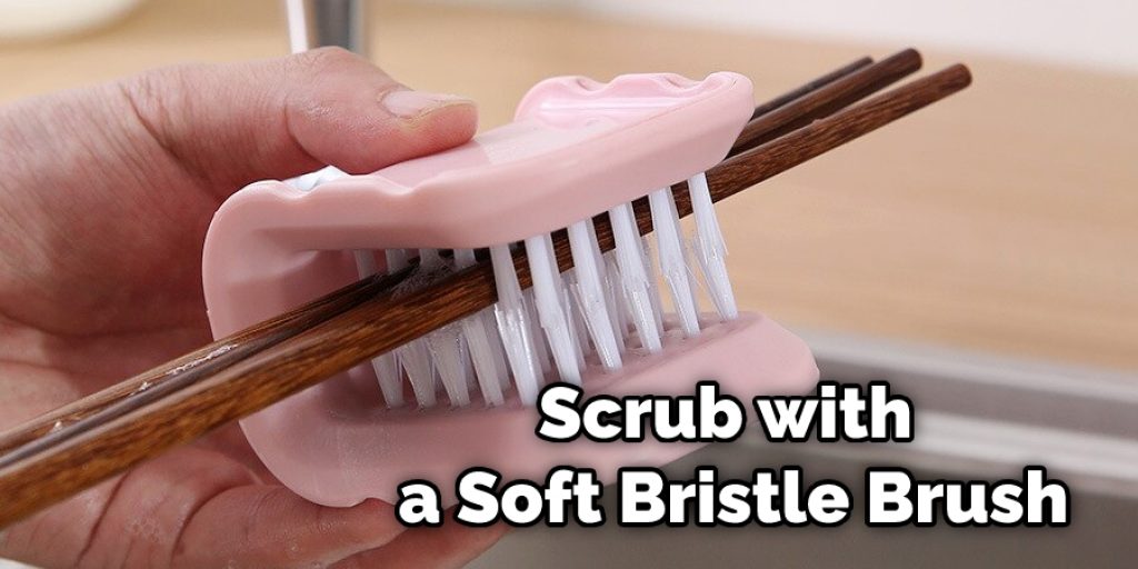 Scrub with a Soft Bristle Brush
