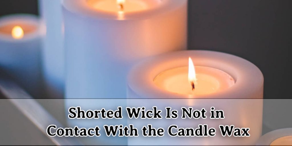 shorted wick is not in contact with the candle wax