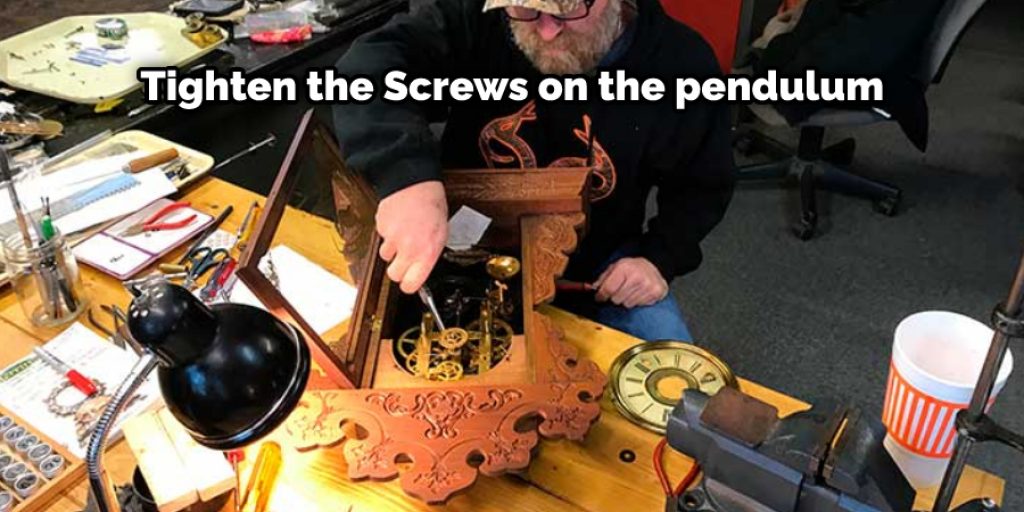 Tighten the Screws on the pendulum