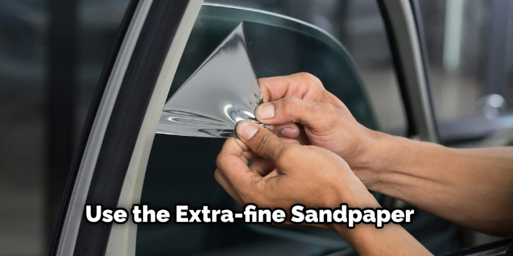  Use the Extra-fine Sandpaper
