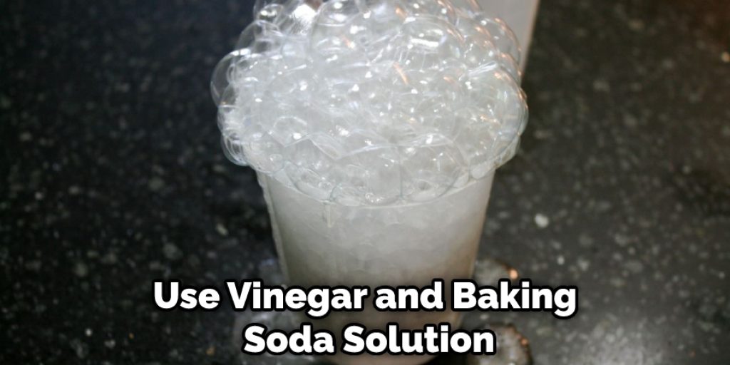 Use Vinegar and Baking Soda Solution