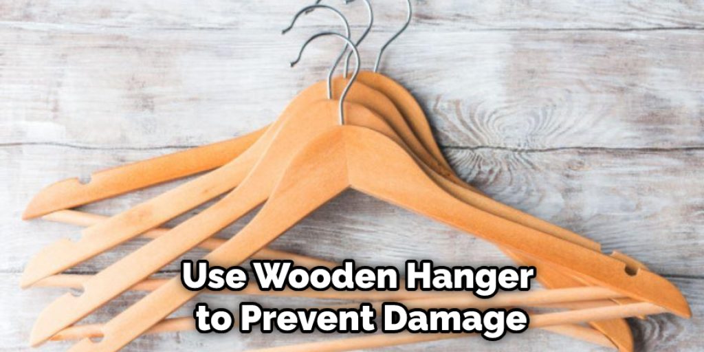 Use Wooden Hanger to Prevent Damage