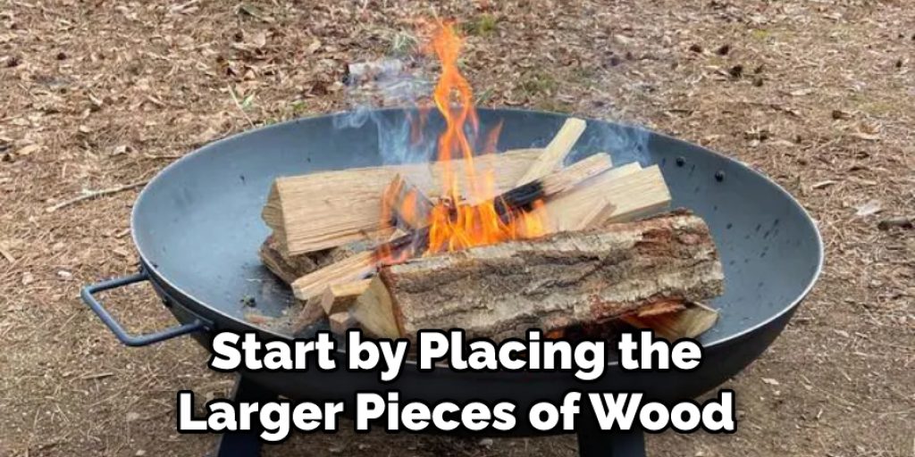 Start by Placing the Larger Pieces of Wood