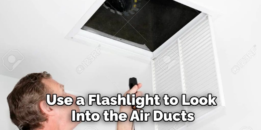 Use a Flashlight to Look Into the Air Ducts