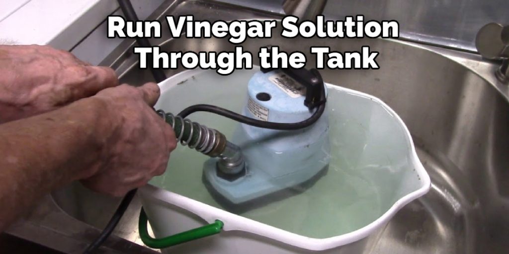 Run Vinegar Solution 
Through the Tank