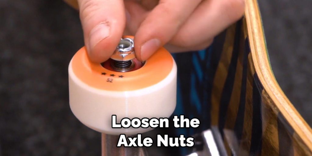  Loosen the Axle Nuts