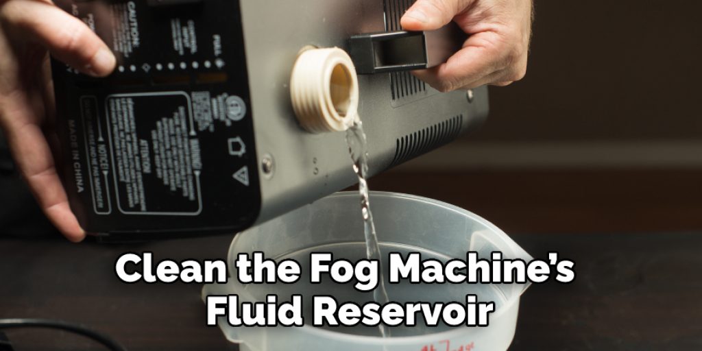 Clean the Fog Machine’s Fluid Reservoir