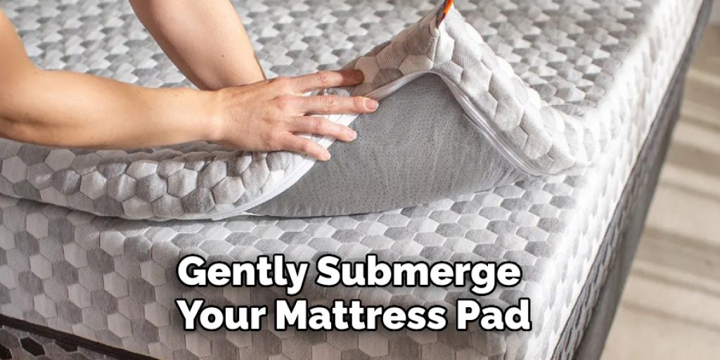 Gently Submerge Your Mattress Pad
