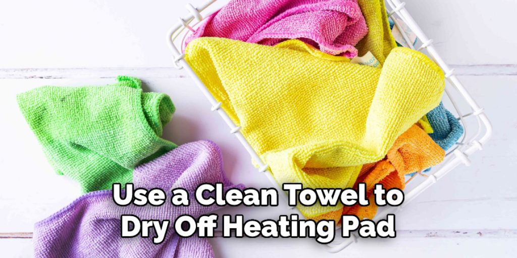 Use a Clean Towel to
Dry Off Heating Pad