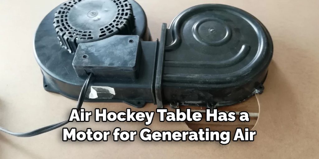 Air Hockey Table Has a Motor for Generating Air