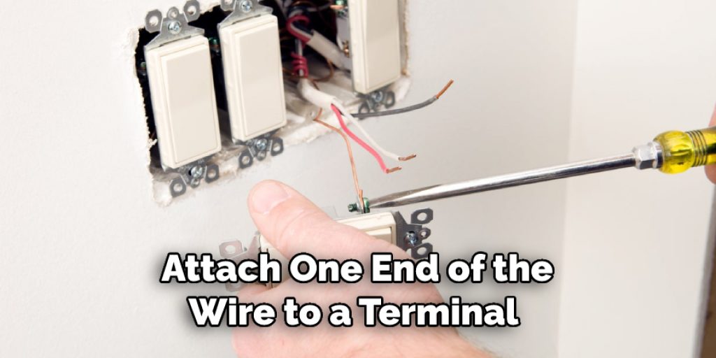 Attach One End of the
Wire to a Terminal 