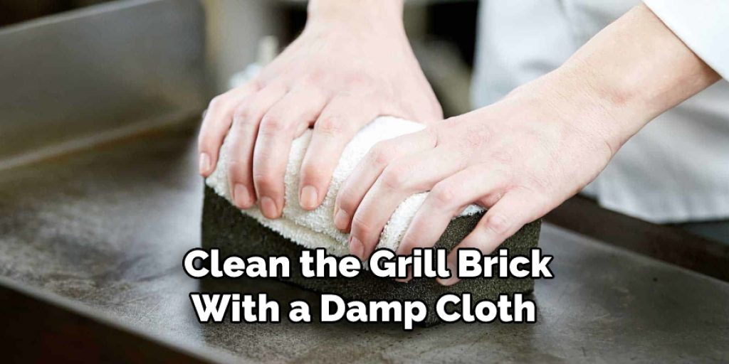  Clean the Grill Brick
With a Damp Cloth