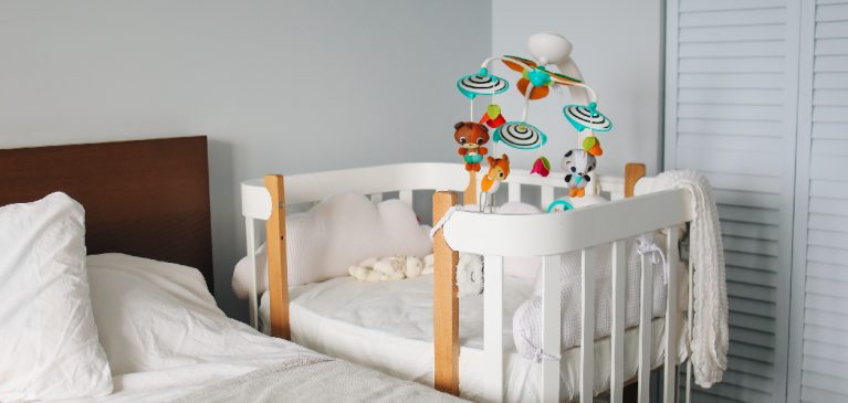 is it safe to elevate crib mattress