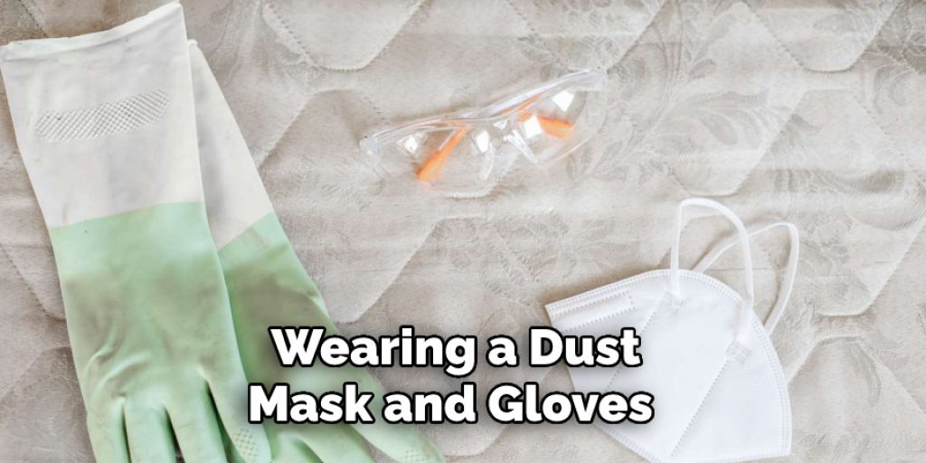 Wearing a Dust
Mask and Gloves 