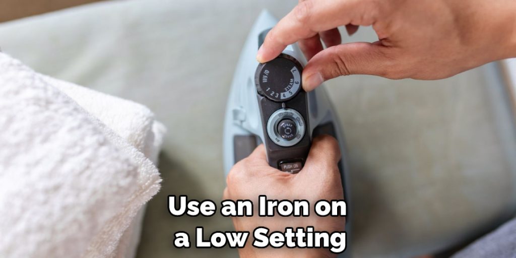 Use an Iron on a Low Setting