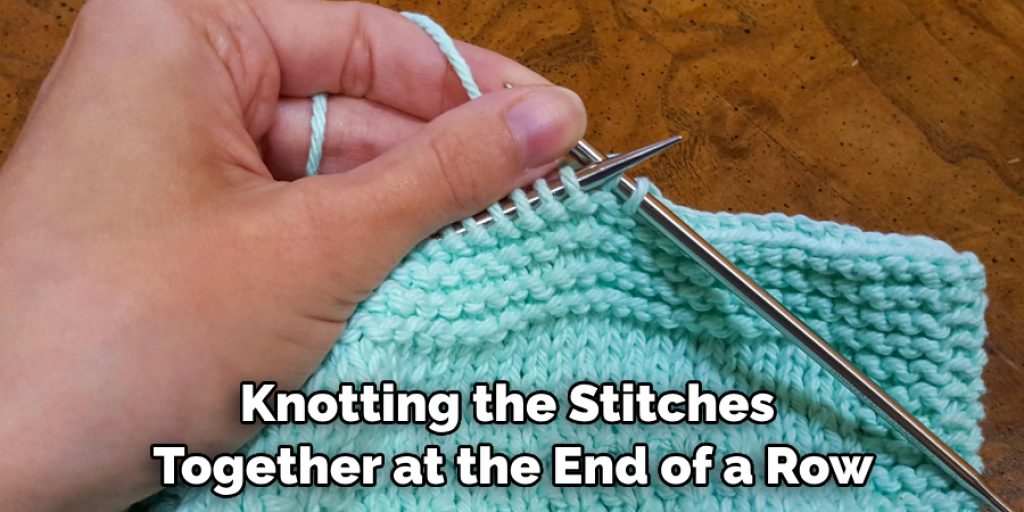 Knotting the Stitches Together at the End of a Row