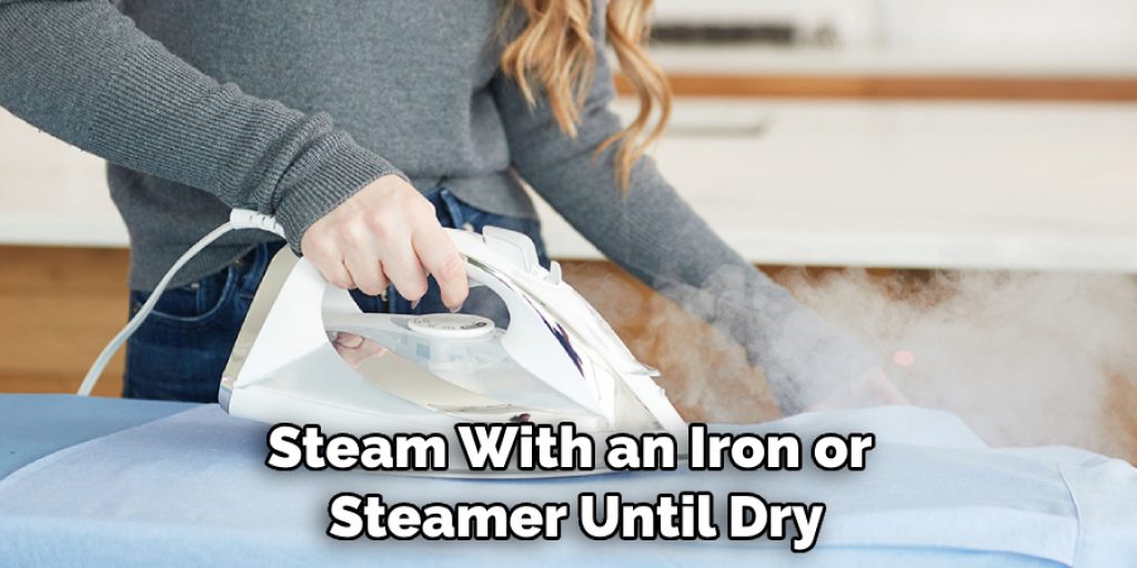 Steam With an Iron or Steamer Until Dry