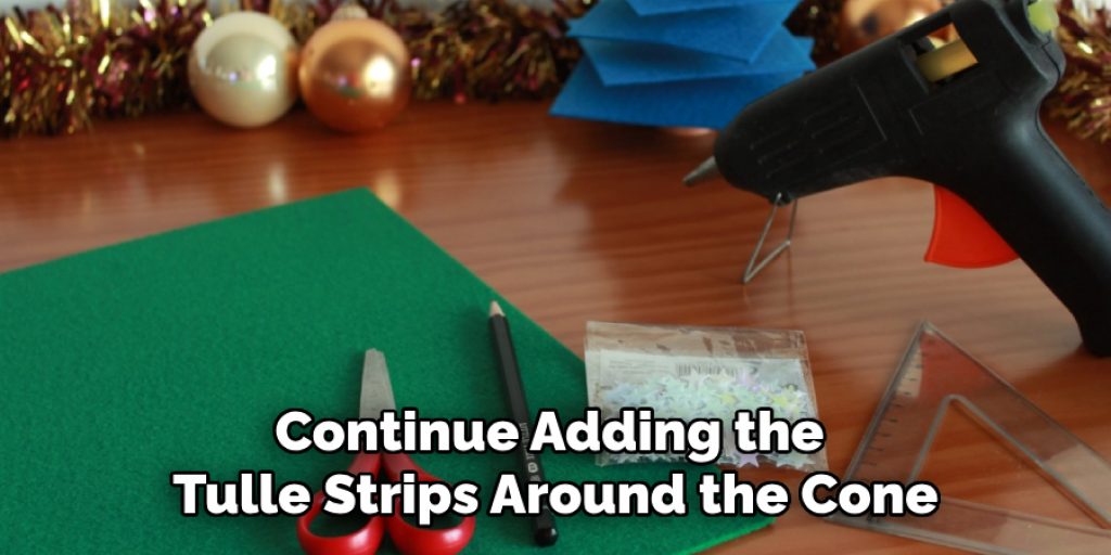 Continue Adding the Tulle Strips Around the Cone
