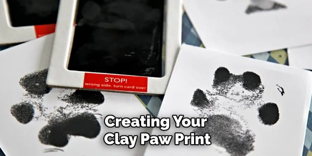 Creating Your 
Clay Paw Print