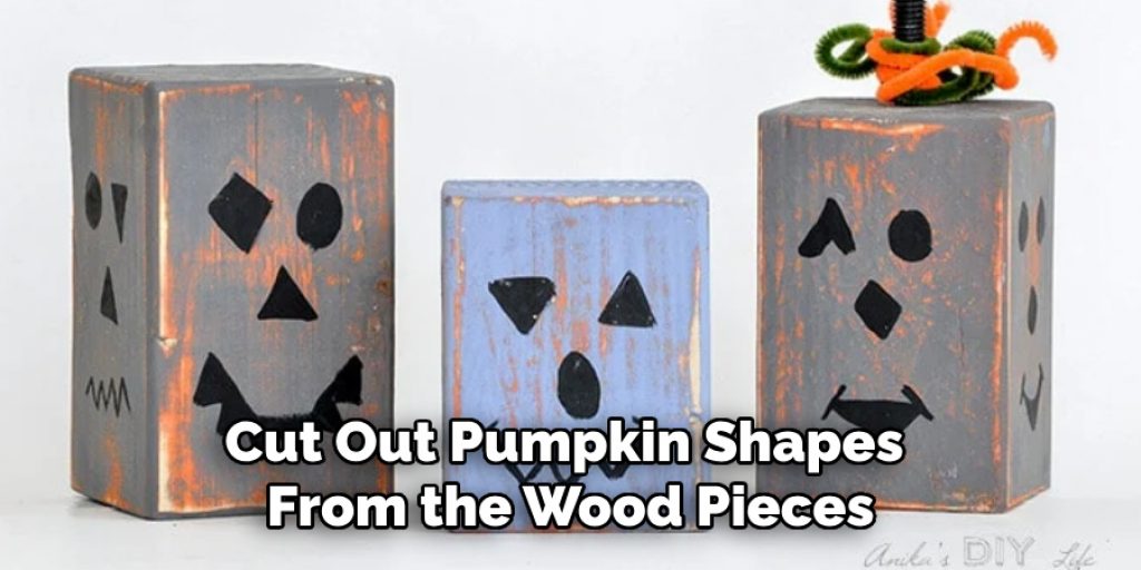 Cut Out Pumpkin Shapes 
From the Wood Pieces