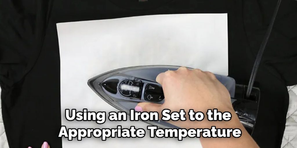 Using an Iron Set to the Appropriate Temperature
