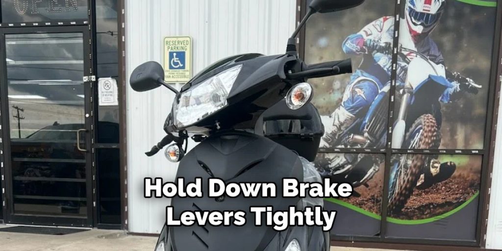 Hold Down Brake Levers Tightly