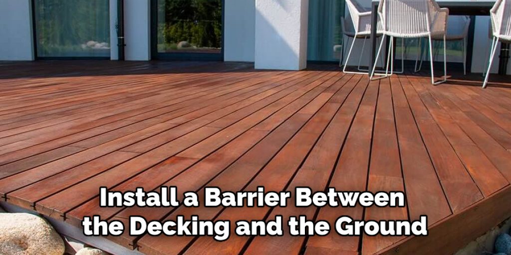 Install a Barrier Between the Decking and the Ground