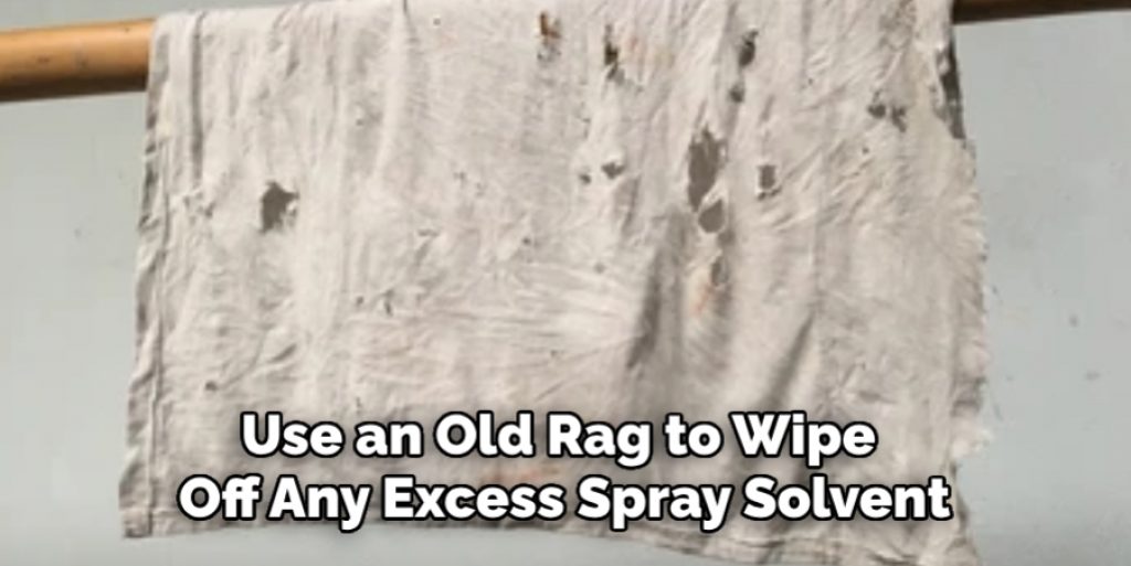 Use an Old Rag to Wipe Off Any Excess Spray Solvent