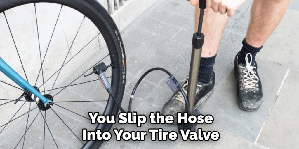 You Slip the Hose Into Your Tire Valve