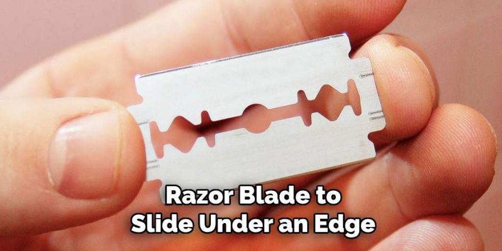 Razor Blade to
Slide Under an Edge