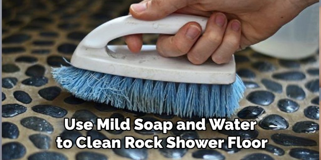 Use Mild Soap and Water to Clean Rock Shower Floor