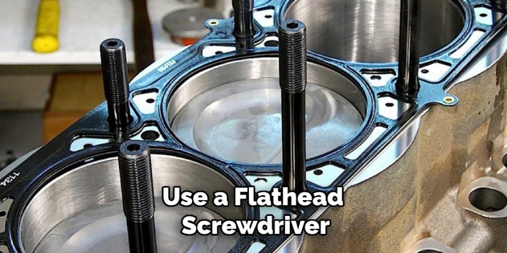 Use a Flathead Screwdriver