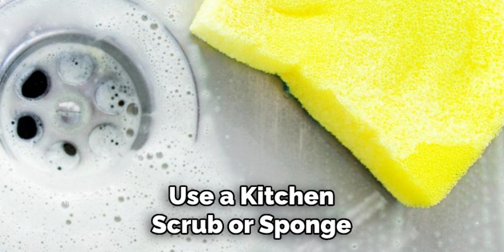 Use a Kitchen Scrub or Sponge 